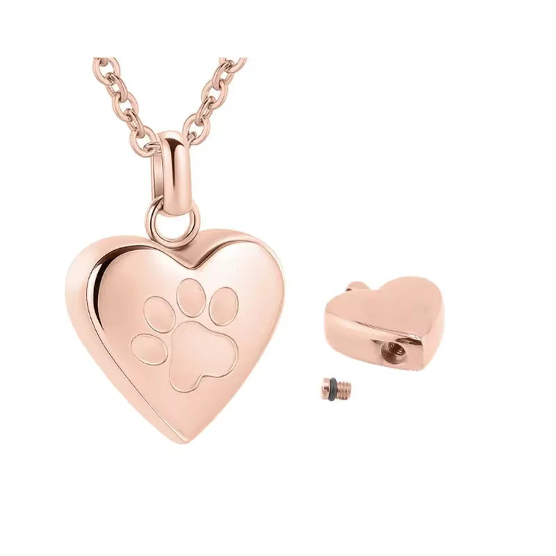 Openable heart-shaped titanium steel casket necklace on a chain, shown in multiple colour finishes.