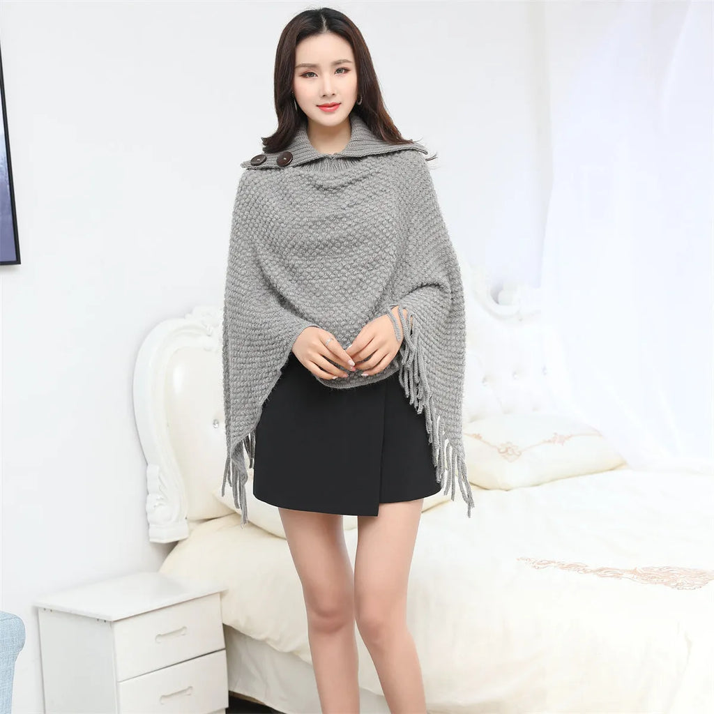 Women's sleeveless knit shawl cloak with dotted pattern in acrylic fibre shown in various colours