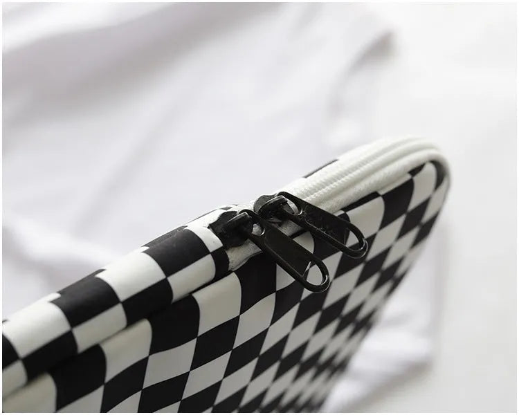 Checkerboard polyester hand file bag in plaid or space, 11-inch or 14-inch laptop sleeve.