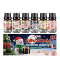 Christmas essential oil set showing six 10ml bottles with festive fragrances including Christmas cake and gingerbread scents