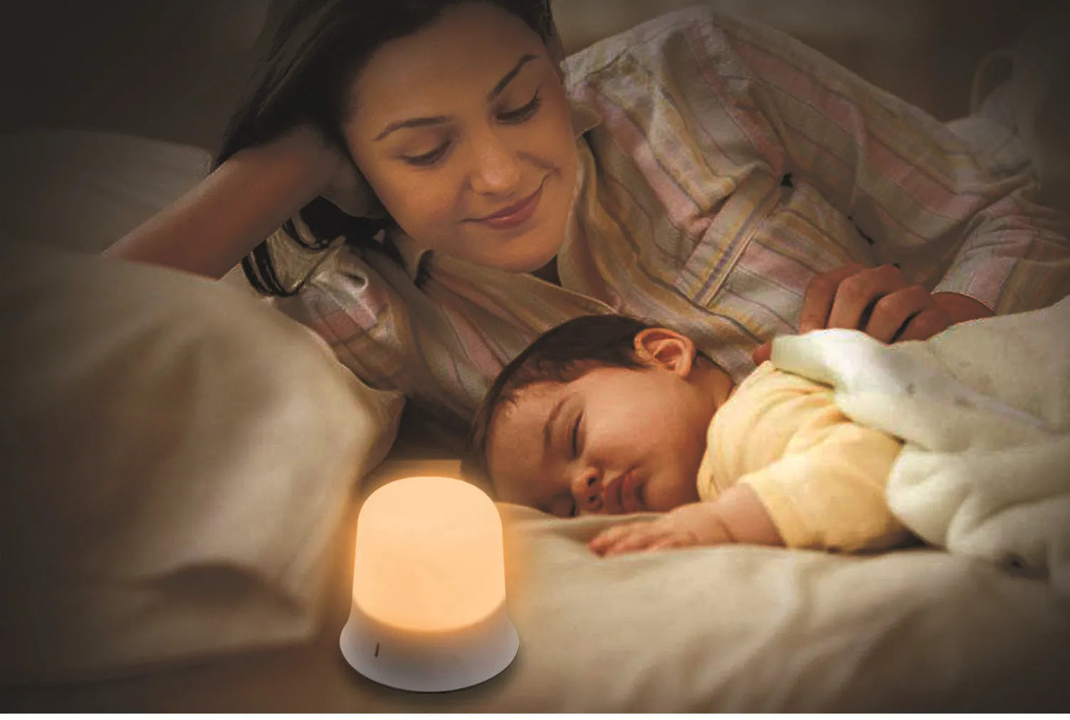 White bedside night light with touch controls, motion sensor, and rechargeable battery.