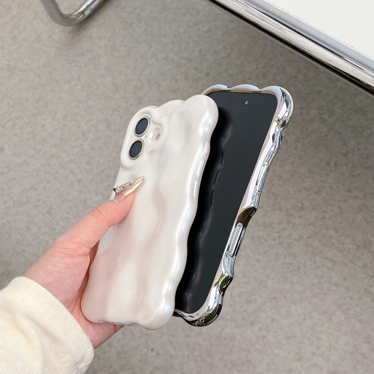 Electroplated TPU phone case for iPhone with wave bubble design, anti-fall and anti-fingerprint functions, shown in silver plating