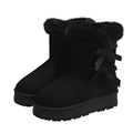 Women's suede ankle boots with fleece lining, flat heel, and bow detail in beige