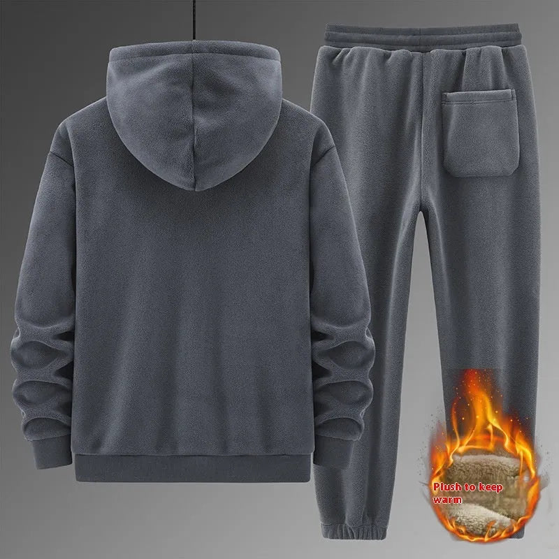 Grey cashmere-blend hooded sweater and matching trousers laid flat as a casual sports suit set.