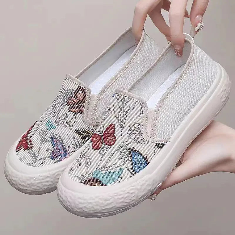 Old Beijing women's canvas slip-on shoes with plastic soles in black and white colours