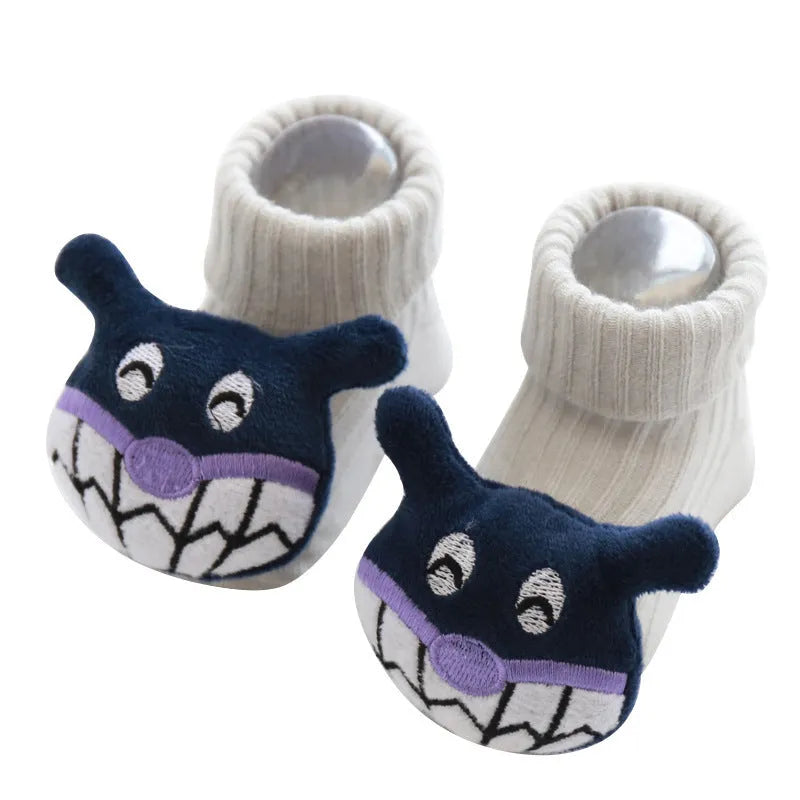 Cotton baby socks in various colours and patterns including bows, stars, and animal designs