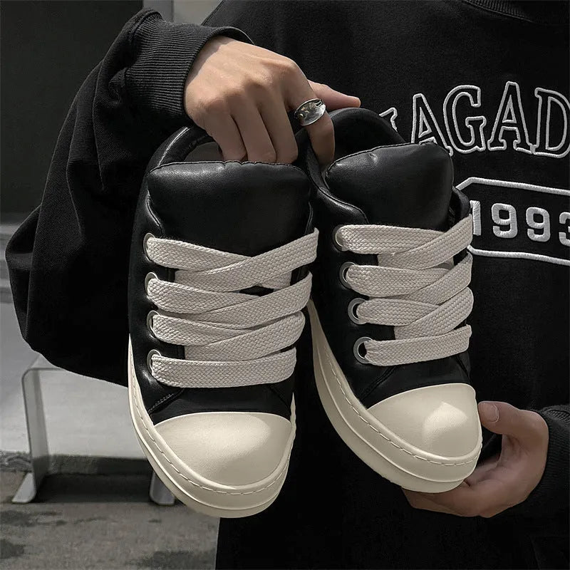 Black men's slip-on casual leather shoes with front lace-up and rubber soles