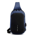 Dark blue Oxford cloth chest bag with adjustable strap, worn across the chest, showing front zipper and square shape.