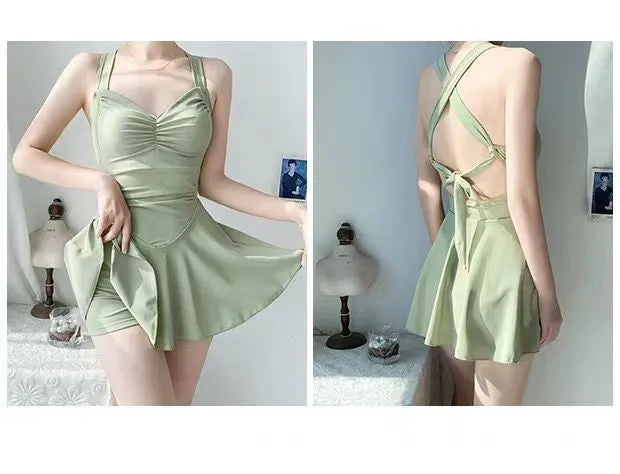 Women's avocado green one-piece boxer swimsuit with backless design