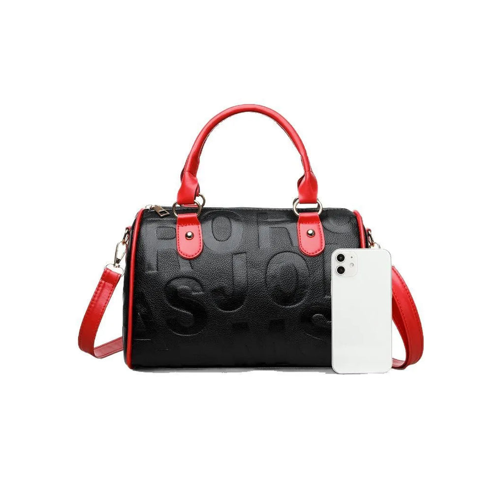 Brown cylindrical crossbody bag with three adjustable shoulder straps showing leather-like PU material texture
