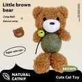 Plush catnip toy shaped as a character, showing a bell inside and a mint ball, with dimensions 15cm by 7cm.