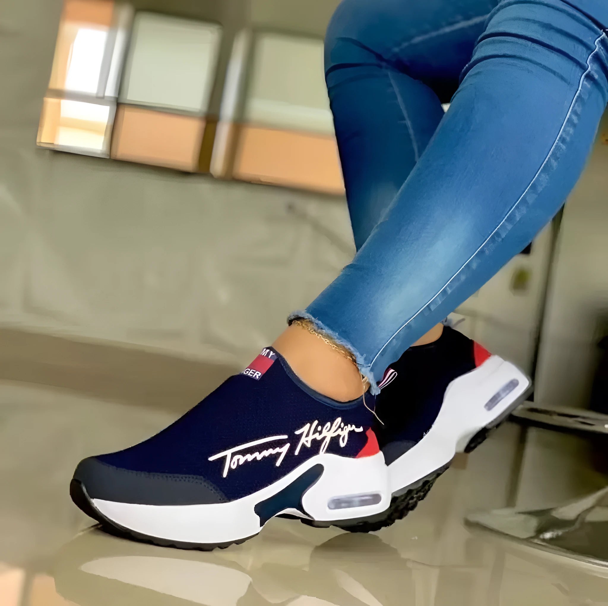 Air cushion slip-on sneakers for women with breathable mesh upper and wedge heel in black