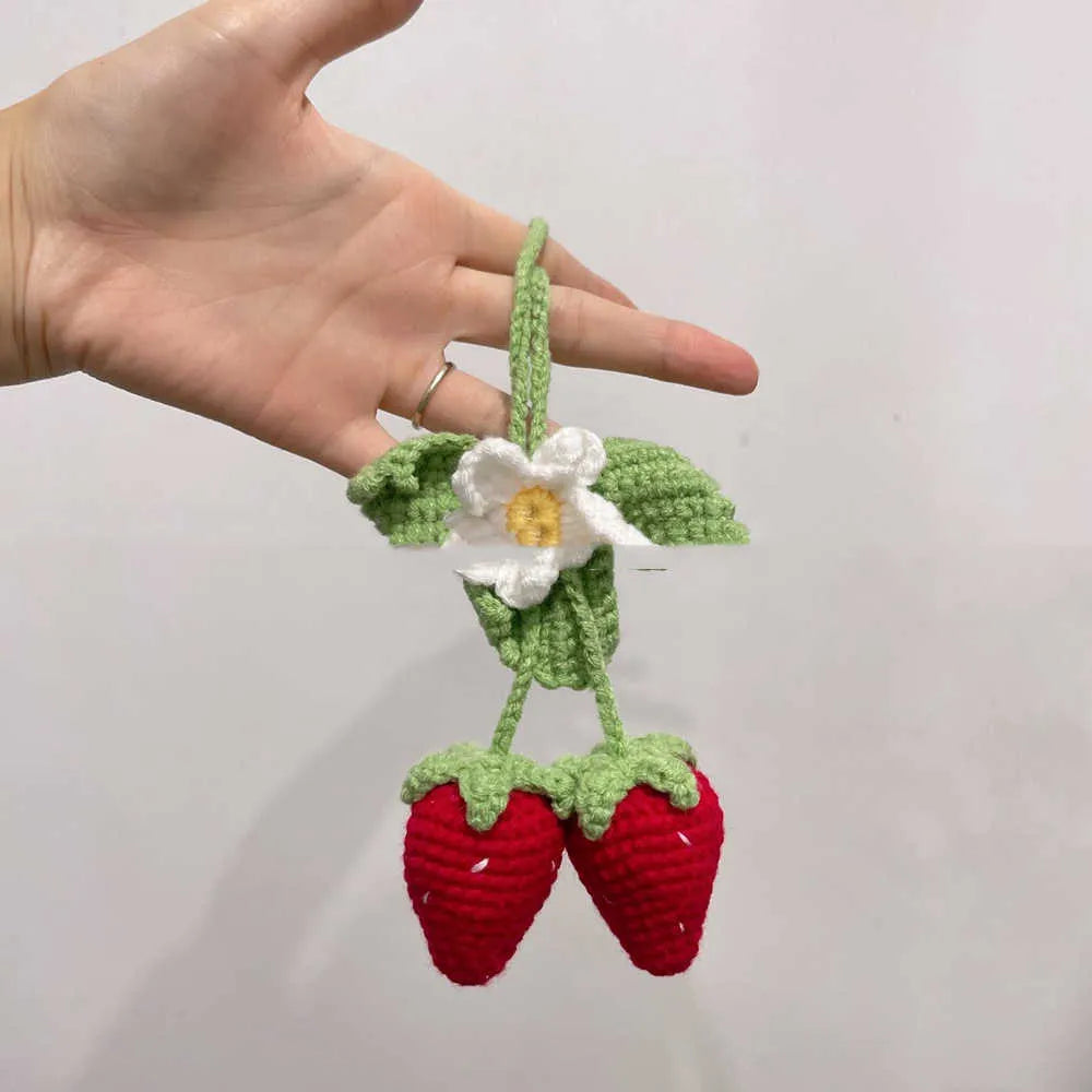 Handmade strawberry-shaped weaving pendant for car decoration, made from cotton and hemp yarn.