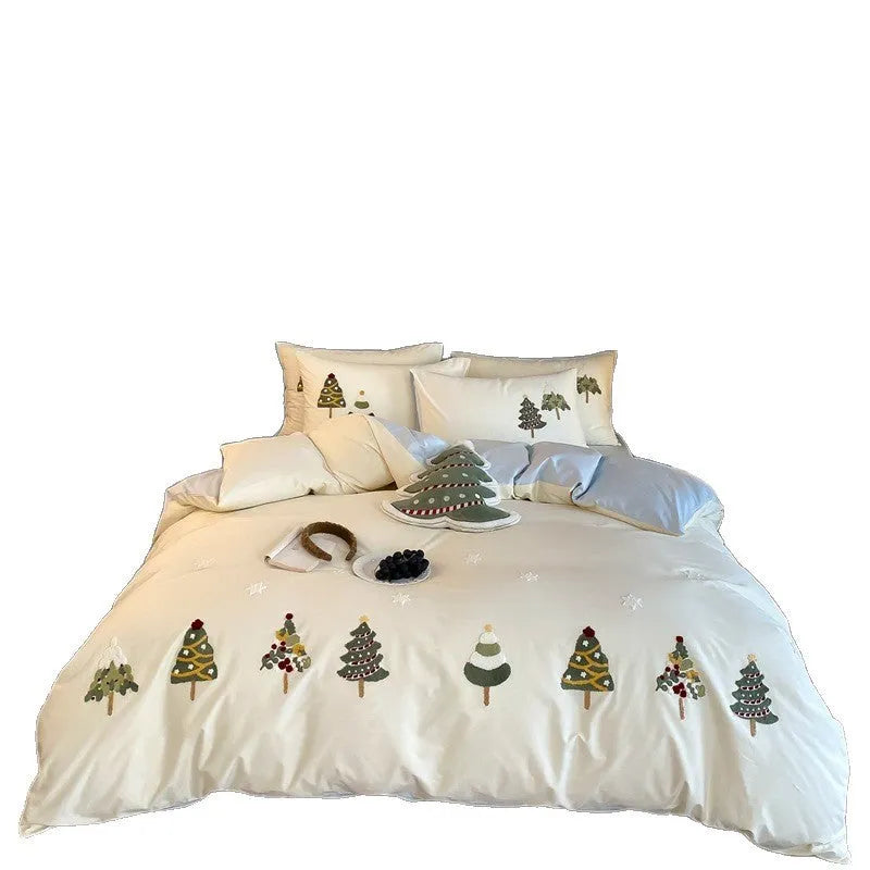 Pure cotton duvet cover and pillowcase set with raised embroidered Christmas tree and floral design in green and cream.