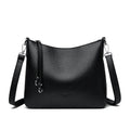 Genuine leather horizontal square shoulder crossbody bag with metal belt detail in beige colour