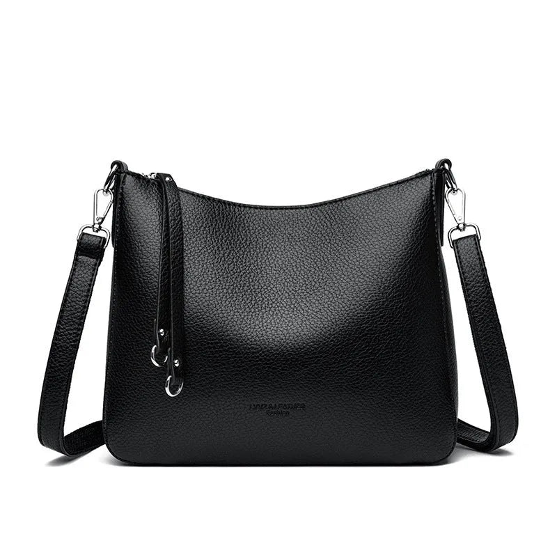 Genuine leather horizontal square shoulder crossbody bag with metal belt detail in beige colour