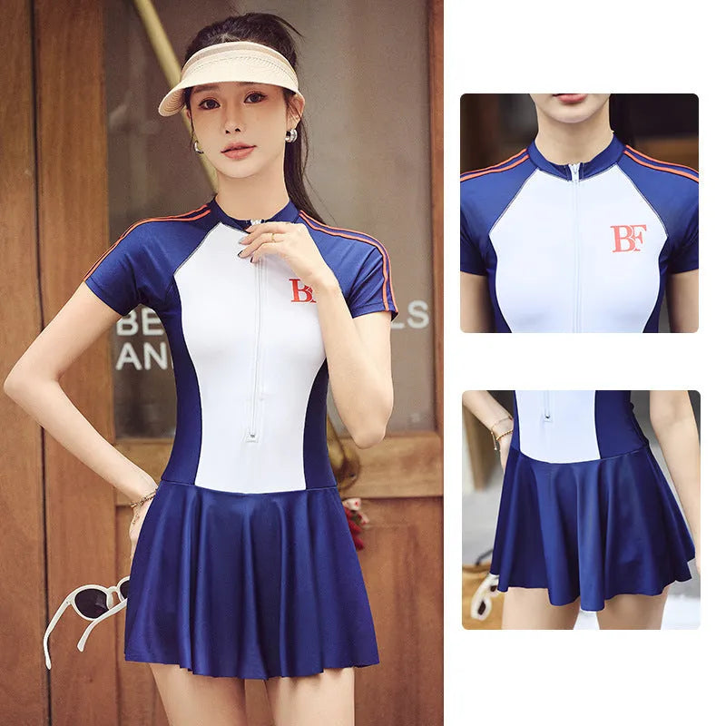 Conservative sports one-piece swimsuit in colour-blocked pattern for fitness and swimming activities