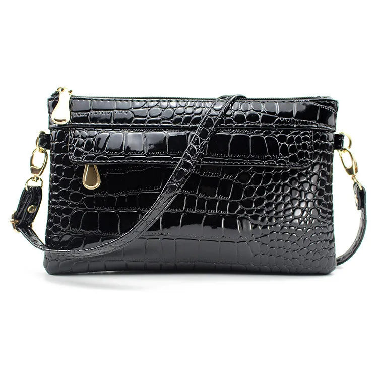Women's black PU messenger shoulder bag with horizontal square shape showing 24cm width