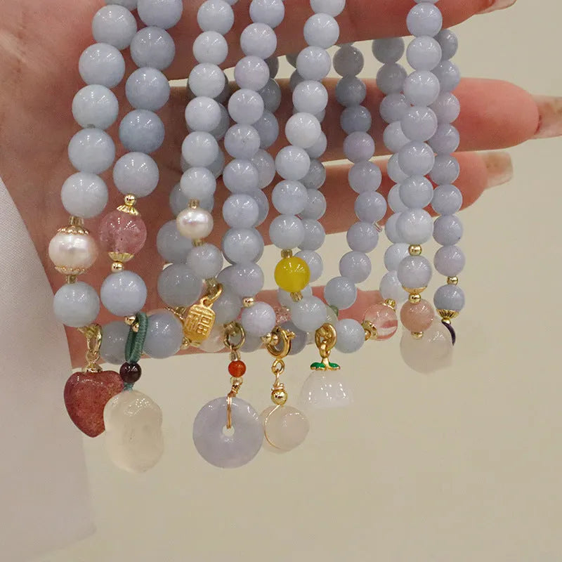 Aquamarine crystal bracelet with gold plated charm pendant for women