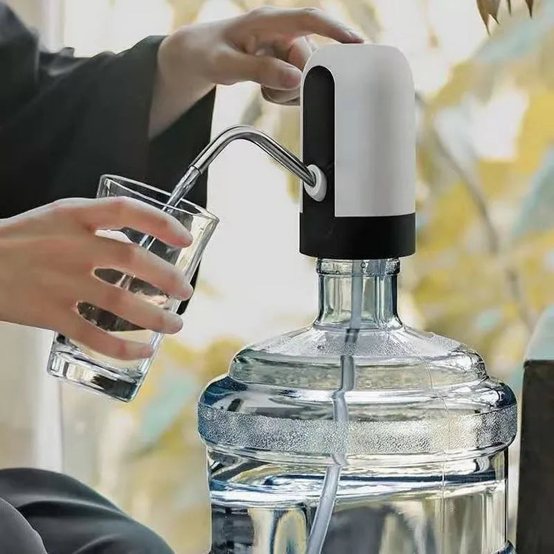 Automatic electric water bottle pump with blue light, USB cord, and black finish on a 5L bottle