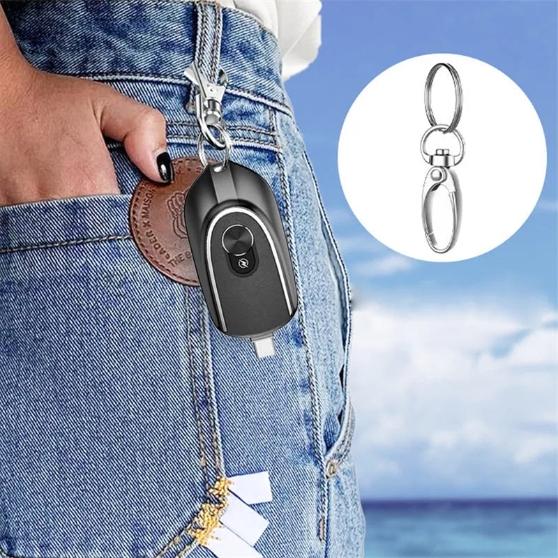 Black mini keychain power bank with Type-C and iPhone outputs, 1200mAh, hanging buckle, 71 x 19.5 x 38mm