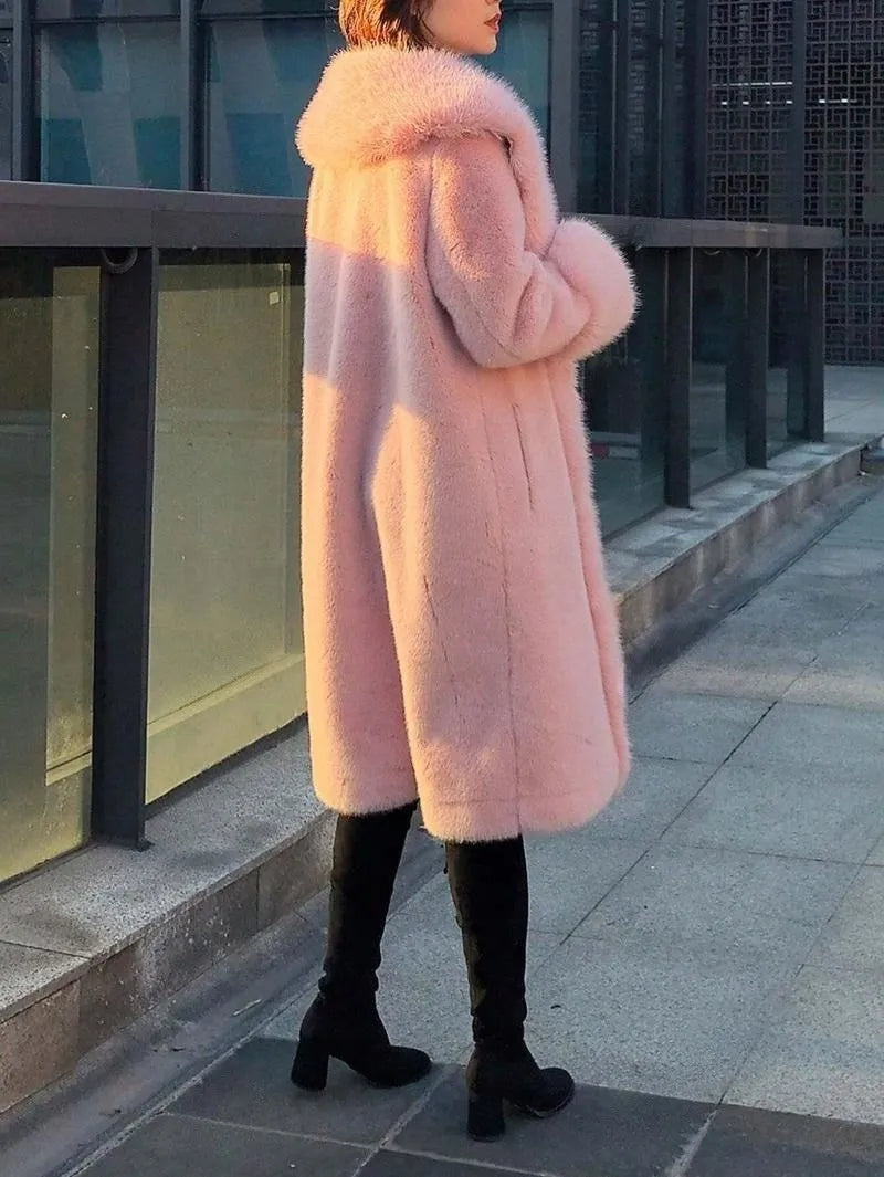 Women's grey thick faux fur mid-length coat with a collar on a model.