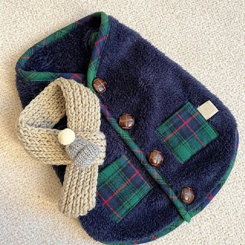 Navy blue pet fleece jacket with checkered pattern, Sherpa lining, decorative buttons, and snowman accent on a small dog