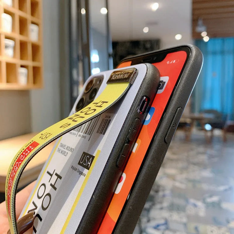 Red mobile phone case for iPhone with attached wristband showing back cover design