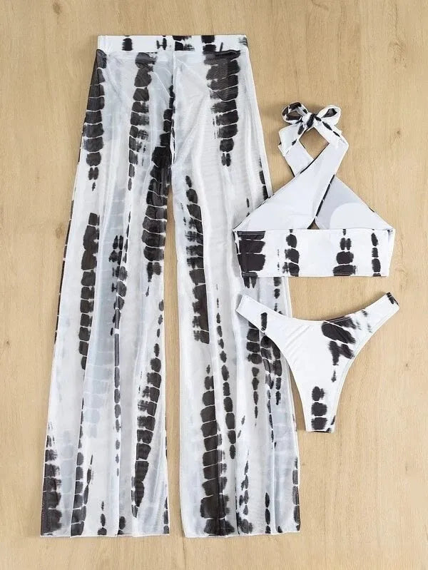 Women's black print three-piece swimsuit set with mesh trousers on hanger