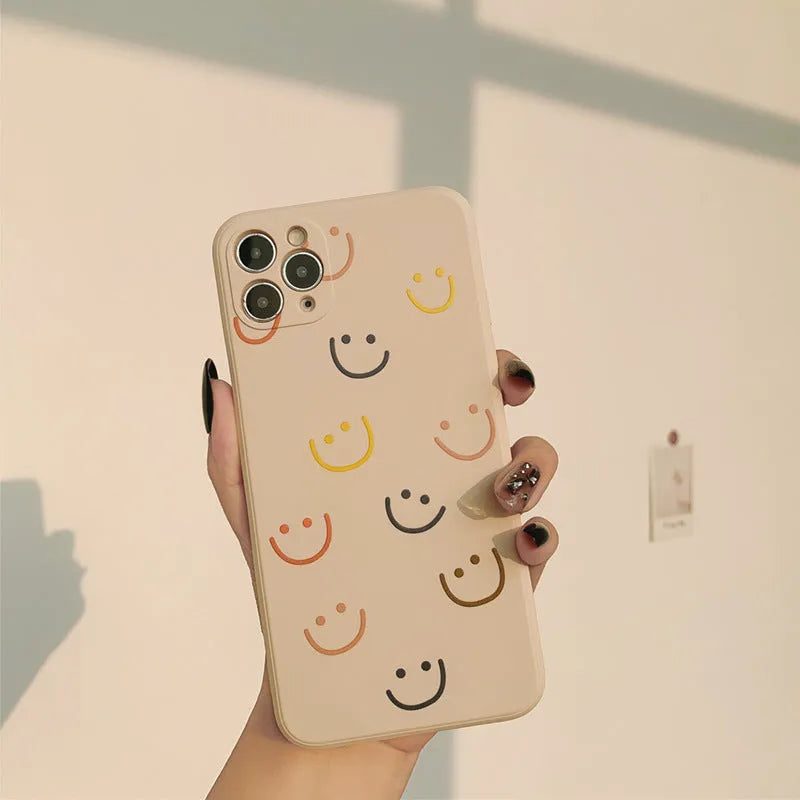 Simple Case Silicone iPhone case in graffiti design, showing Full Screen Smiley, Rainbow, and Watercolor colour options.