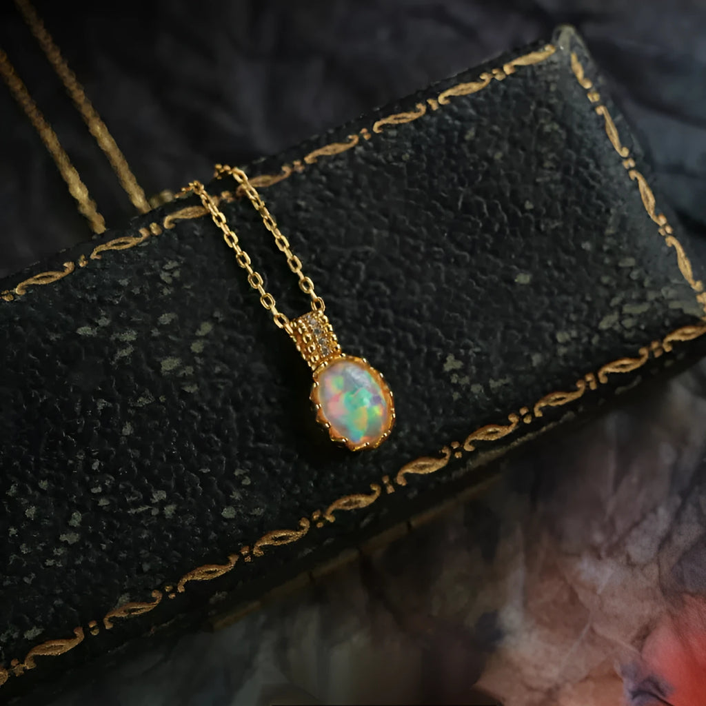 Japanese-style light wings opal pendant necklace in copper with geometric round design