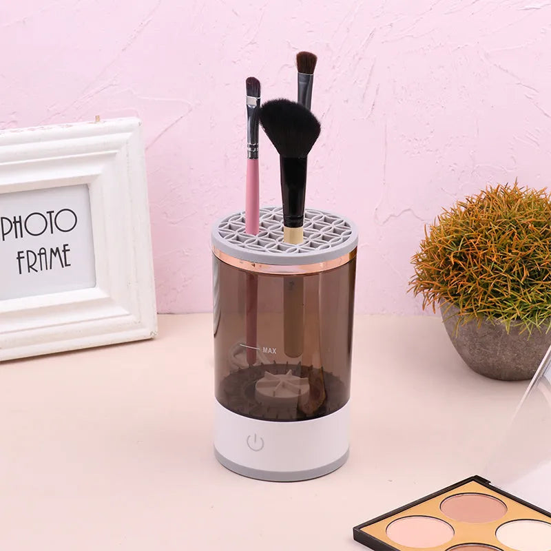 Grey and white electric makeup brush cleaning device with USB charging port