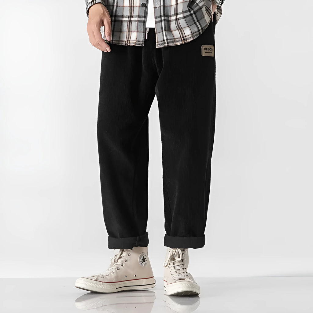 Men's loose straight corduroy sports trousers in Army Green colour showing mid-waist and full length design