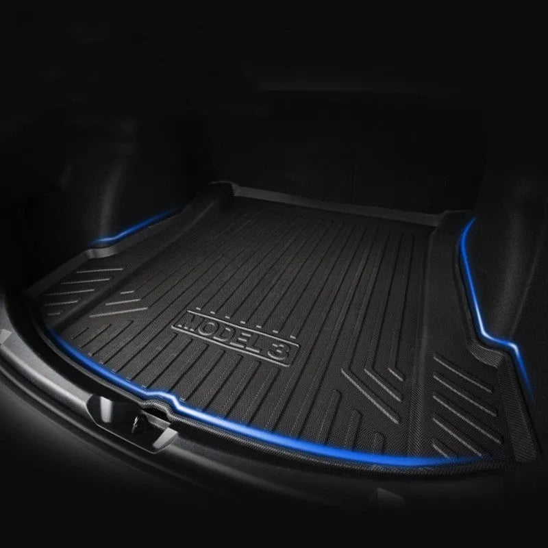 Rubber and TPE floor mat set for a Tesla car interior.