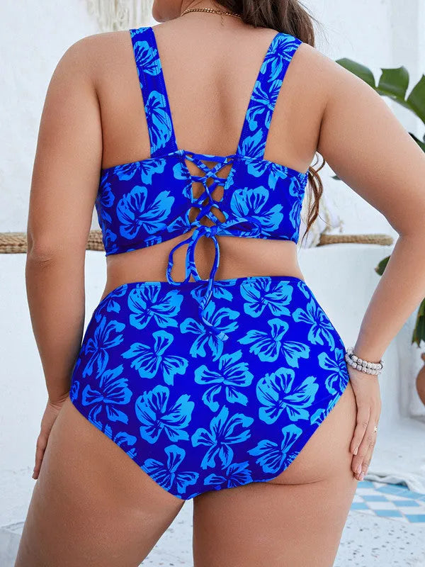 Blue floral print split bikini swimsuit set for women on a mannequin.