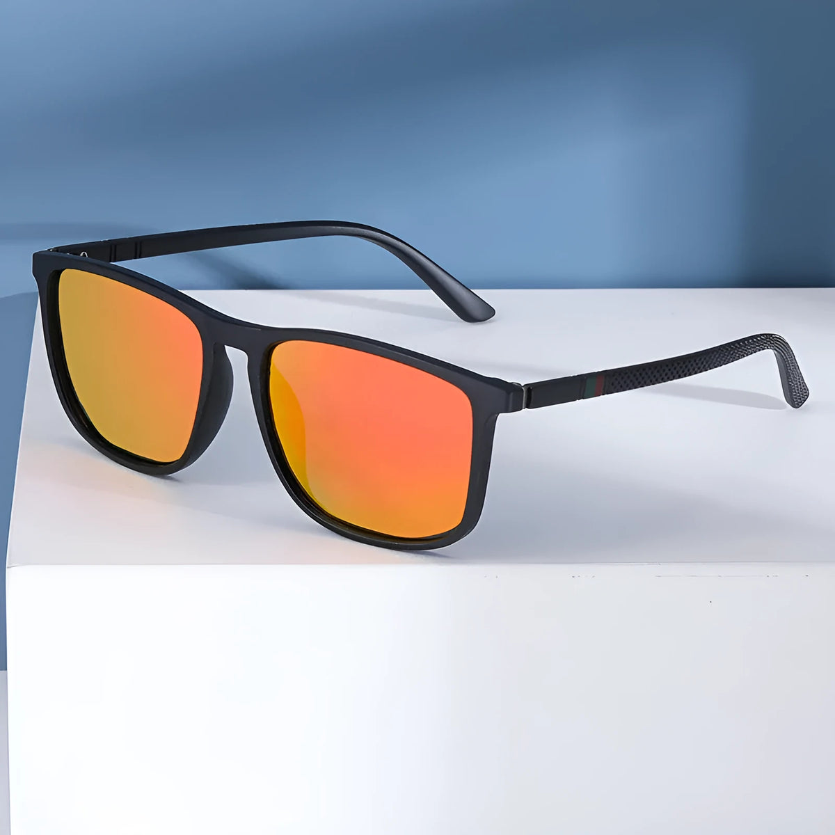 Sports driving polarized sunglasses with black frame and black grey TAC lens on reflective surface