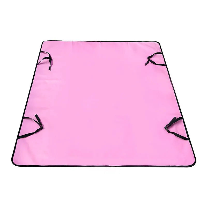 Grey car pet mat with dog bone print covering a vehicle's rear seat.