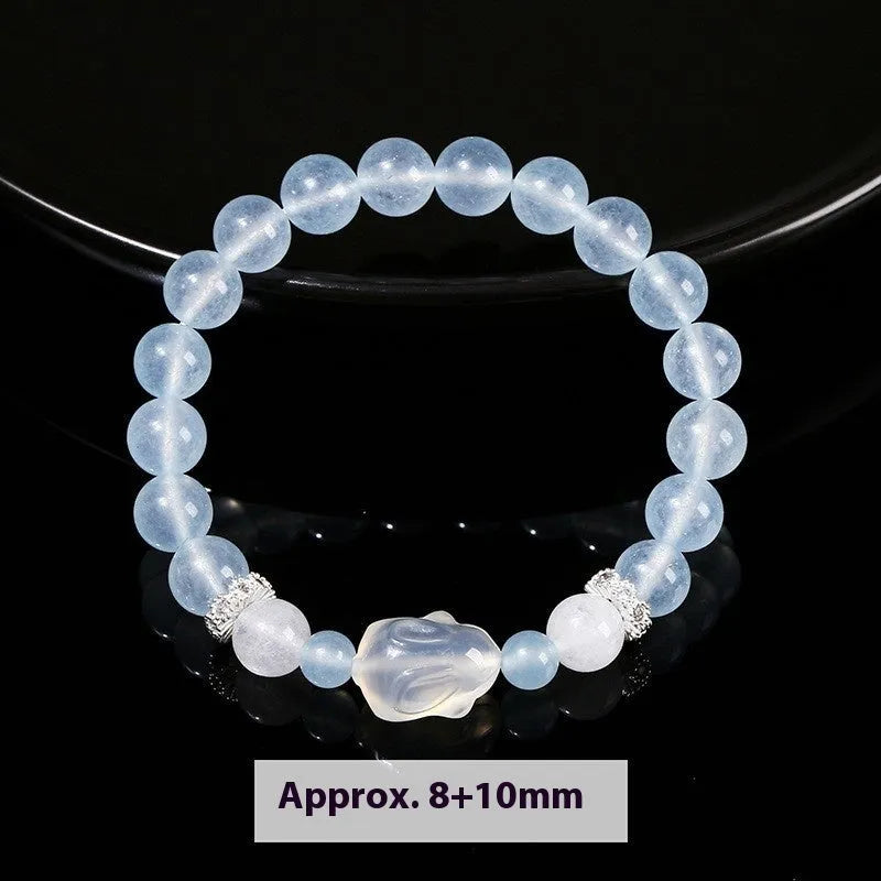 Women's natural crystal charm bracelet with handcrafted details and various gemstone options