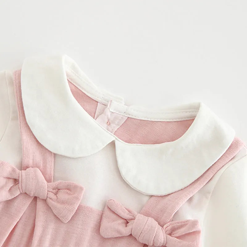 Pink cotton baby girl embroidered jumpsuit with long sleeves and single-breasted closure