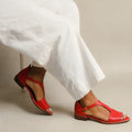Red women's plus size casual sandals with a square buckle and herringbone pattern toe holder.