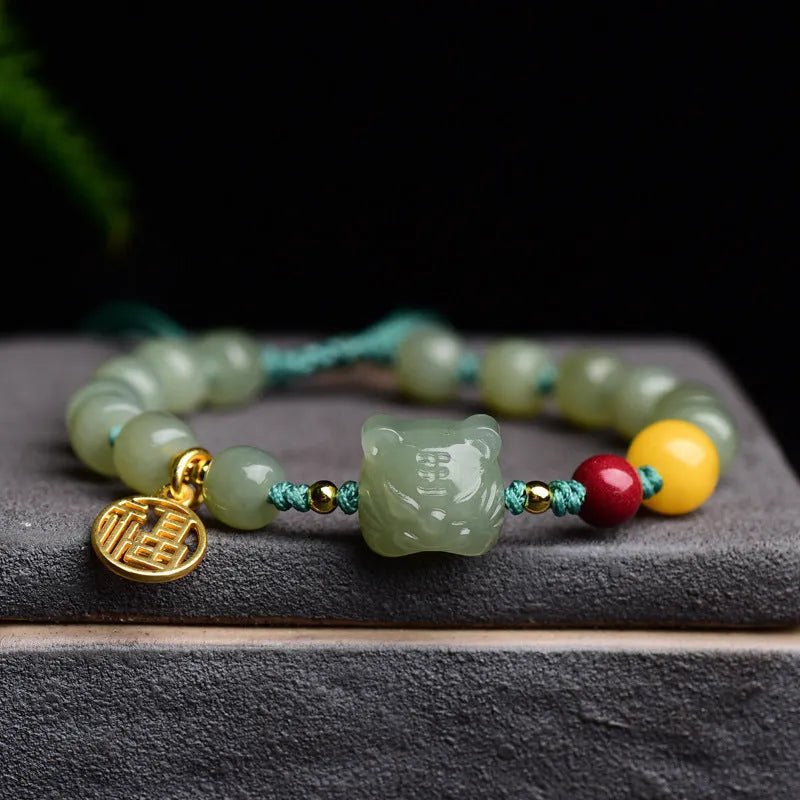 Natural Hetian jade and cinnabar beeswax bead bracelet with animal zodiac design, bead size 5x7mm.