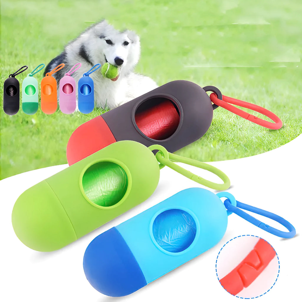 Compact black dog waste bag holder with a metal hook and Velcro strap, shown next to a roll of bags.