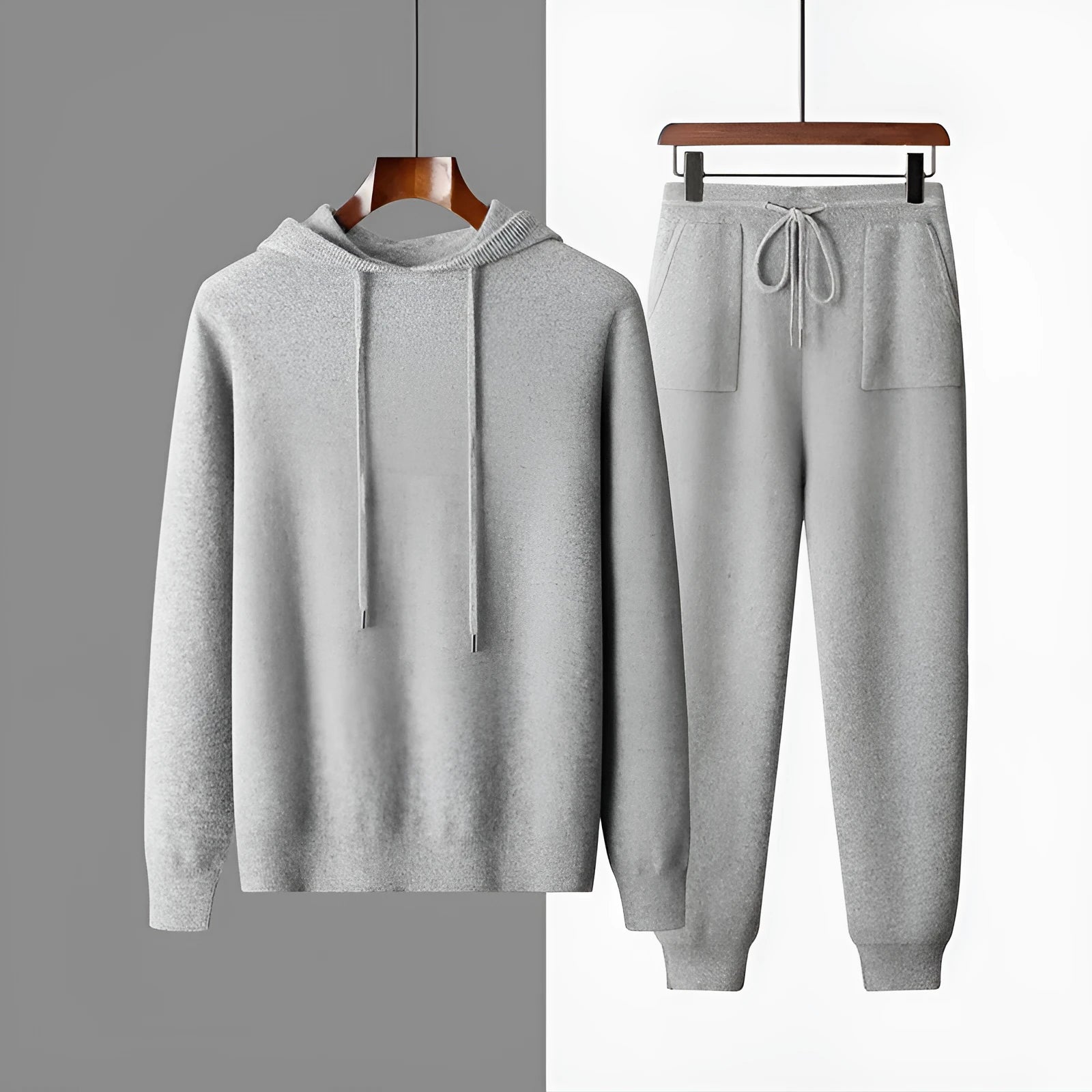 Men's light grey cashmere hooded sweatshirt and long pants casual winter set laid flat.