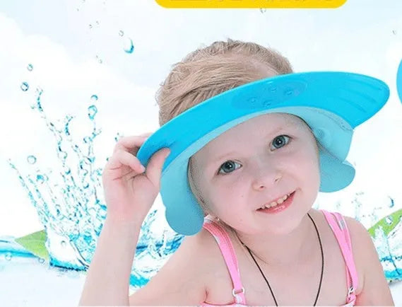 Adjustable baby shower cap in soft silicone and PP, shown in green, pink, and yellow.
