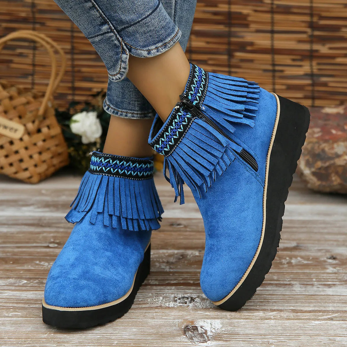 Women's suede wedge ankle boots in dark brown with a side zipper and thick rubber sole.