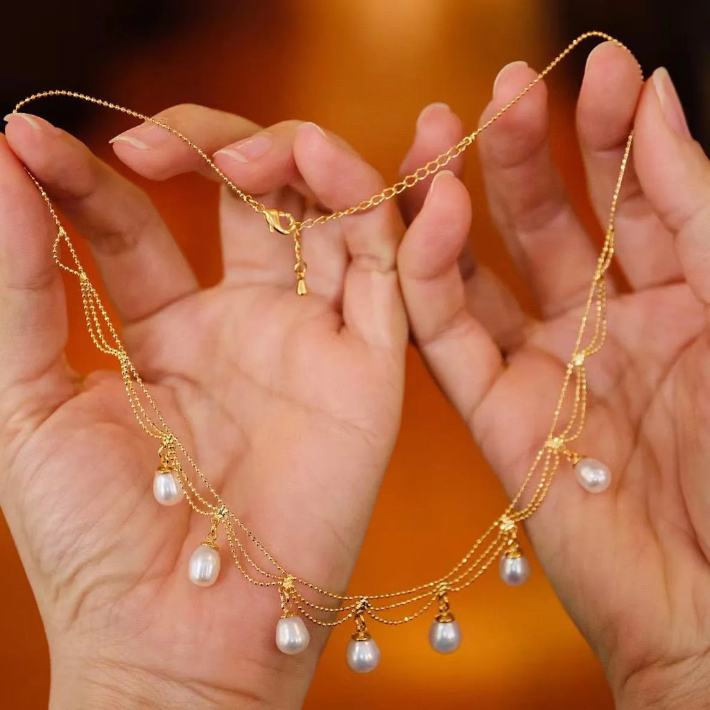 Vintage natural freshwater pearl necklace on display, 45cm clavicle chain with 14K gold plated clasp, handmade pearl lace style