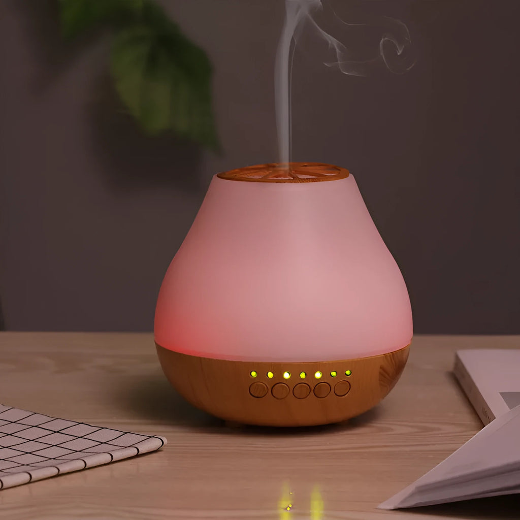 Wood grain finish USB essential oil aroma diffuser with optional Bluetooth control on a table