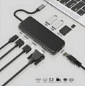 9in1 USB hub with dual HDMI, VGA, and Gigabit Ethernet ports on a desk