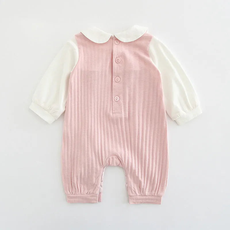 Pink cotton baby girl embroidered jumpsuit with long sleeves and single-breasted closure