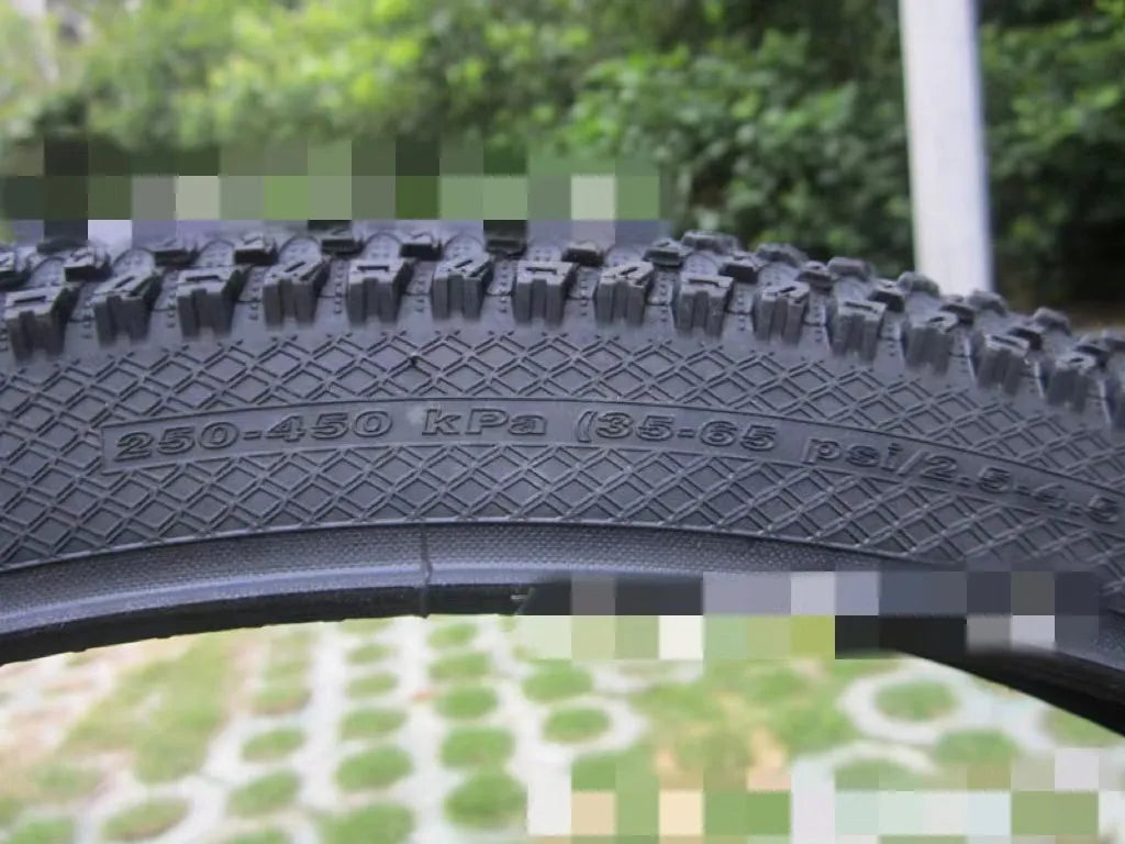 Ultralight puncture proof mountain bike tyre shown in 26, 27.5, and 29 inch sizes with black and white label sidewall options.